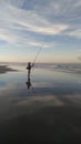 Denpasar, Indonesia, Asia Ã¢â¬â March 5, 2017: someone is fishing on the beach