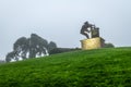 Dense fog over Napa County and the Wine Crusher Statue in Napa, California Royalty Free Stock Photo