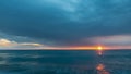 Dense blue clouds and turquoise sea. Royalty Free Stock Photo