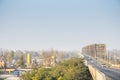 Dense car traffic passing by the Pancevacki Most, or Pancevo bridge, during a day of bad atmospheric air quality with pollution