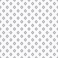 Dense dotted black rhombus pattern on off white background