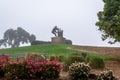 Dense fog over Napa County and the Wine Crusher Statue in Napa, California Royalty Free Stock Photo