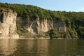 Dense forest on a cliff above the river