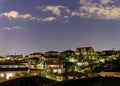 Dense homes in quiet suburban neighborhood at night