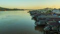 Dense neighborhood of wooden houses on Mahakam riverbank, Borneo, Indonesia