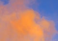 dense orange smoke on blue sky