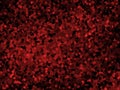 Abstract Crimson Red Bokeh Gradient Background with Dense Circular Confetti Pattern Royalty Free Stock Photo