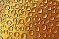 Dense water drops on orange background Royalty Free Stock Photo