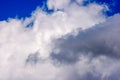 Dense white clouds on a beautiful summer blue sky Royalty Free Stock Photo