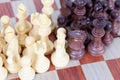 Densely packed chess pieces on the chessboard Royalty Free Stock Photo