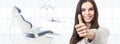 Dental care concept, beautiful smiling woman hands thumbs up on