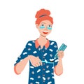 Daily dental care. Girl in pajamas brushes her teeth with a herbal paste and a carbon bristle brush. Morning and evening