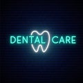 Dental Care neon signboard. Royalty Free Stock Photo