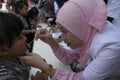 DENTAL CHILDREN IN CHECKS BY YOUNG DOCTOR