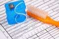 Dental claim form with toothbrush Royalty Free Stock Photo