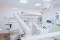 Dental clinic interior with modern dentistry equipment. Dental office. White tone Royalty Free Stock Photo
