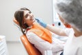 Woman at the reception of a dentist in a dental clinic.