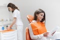 Woman at the reception of a dentist in a dental clinic.