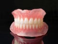 Dental denture on black background Royalty Free Stock Photo