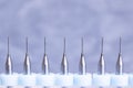 Dental drill attachment set on gray background Royalty Free Stock Photo