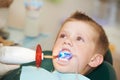 Dental filing of child tooth by Royalty Free Stock Photo