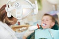 Dental filing of child tooth by ultraviolet light