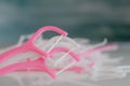 Dental floss on holders in pink and white colors. Healthy teeth concept Royalty Free Stock Photo