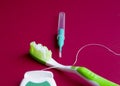 Dental floss, interdental brush and toothbrush Royalty Free Stock Photo