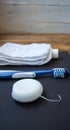 Dental floss toothbrush toothpaste towel Royalty Free Stock Photo