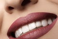 Dental. Happy smile with red lips make-up, white healthy teeth Royalty Free Stock Photo