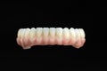 Dental health care. Ceramic zirconium in final version. Close up dental prosthesis on zirconium oxide implants