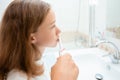 Dental hygiene. Happy little blonde girl brushing her teeth. Healthy concept Royalty Free Stock Photo
