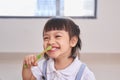 Dental hygiene. happy little girl brushing her teeth Royalty Free Stock Photo