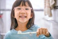 Dental hygiene. happy little girl brushing her teeth.Little girl brushing teeth in bath Royalty Free Stock Photo