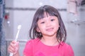 Dental hygiene. happy little girl brushing her teeth.Little girl brushing teeth in bath Royalty Free Stock Photo