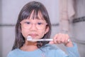 Dental hygiene. happy little girl brushing her teeth.Little girl brushing teeth in bath Royalty Free Stock Photo