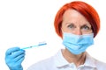 Dental hygienist in red hair with toothbrush