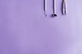 Dental instruments on colorful background with copy space