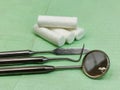 Dental instruments and swabs on a napkin, close-up Royalty Free Stock Photo