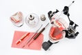 Dental lab articulator with equipments for denture Royalty Free Stock Photo