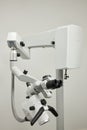 Dental microscope on the background of modern dentistry. Medical equipment. Dental operating microscope with rotary