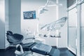 Dental office with dental chair, computer and dentist tools Royalty Free Stock Photo