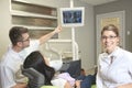 A dental office with employee and client Royalty Free Stock Photo