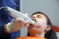 Dental office. Panoramic 3D dental scan. The dentist\'s workplace. Male dentist with patient in clinic.