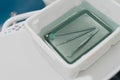 Dental and oral procedure tools in sterilising liquid Royalty Free Stock Photo
