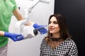 Dental patient takes an x-ray of the oral cavity