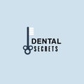 Dental secrets logo with toothbrush forming key symbol for dentist stomatology