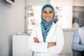 Dental Services. Portrait Of Smiling Islamic Dentist Woman Standing With Folded Arms