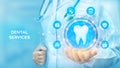 Dental servises. Dentistry concept. Dental insurance. Dental care, taking care of teeth. Doctor holding in hand tooth icon and