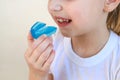 Dental simulator for teeth alignment . The child has mouth guards on his teeth